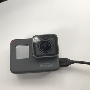 Gopro hero 5 black,extension pole,64gb memory card